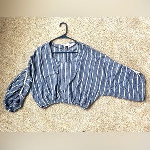 Striped loose-fitting blouse.